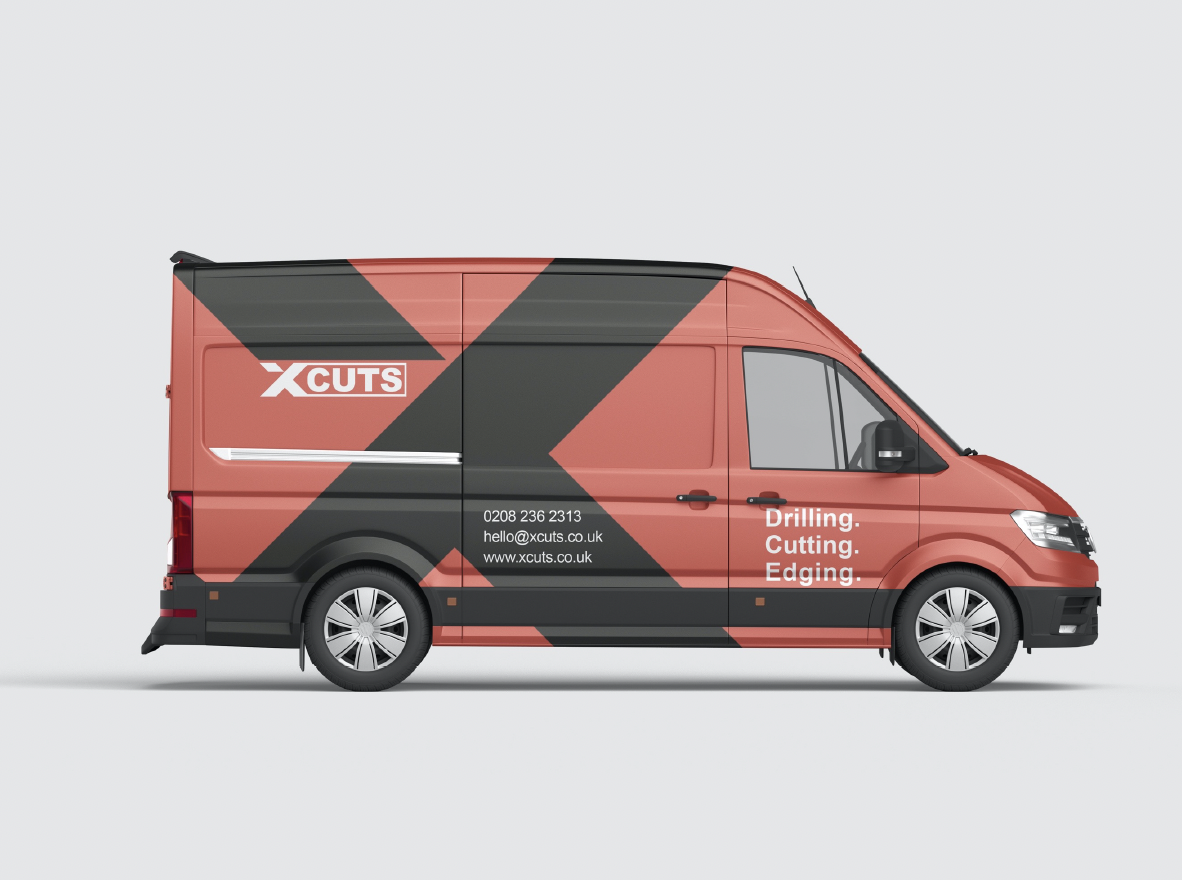 XCuts vehicle livery — red and charcoal VW Crafter van with the X-tile pattern wrap, white XCUTS wordmark, Drilling. Cutting. Edging. tagline and 0208 236 2313 · hello@xcuts.co.uk · www.xcuts.co.uk contact details